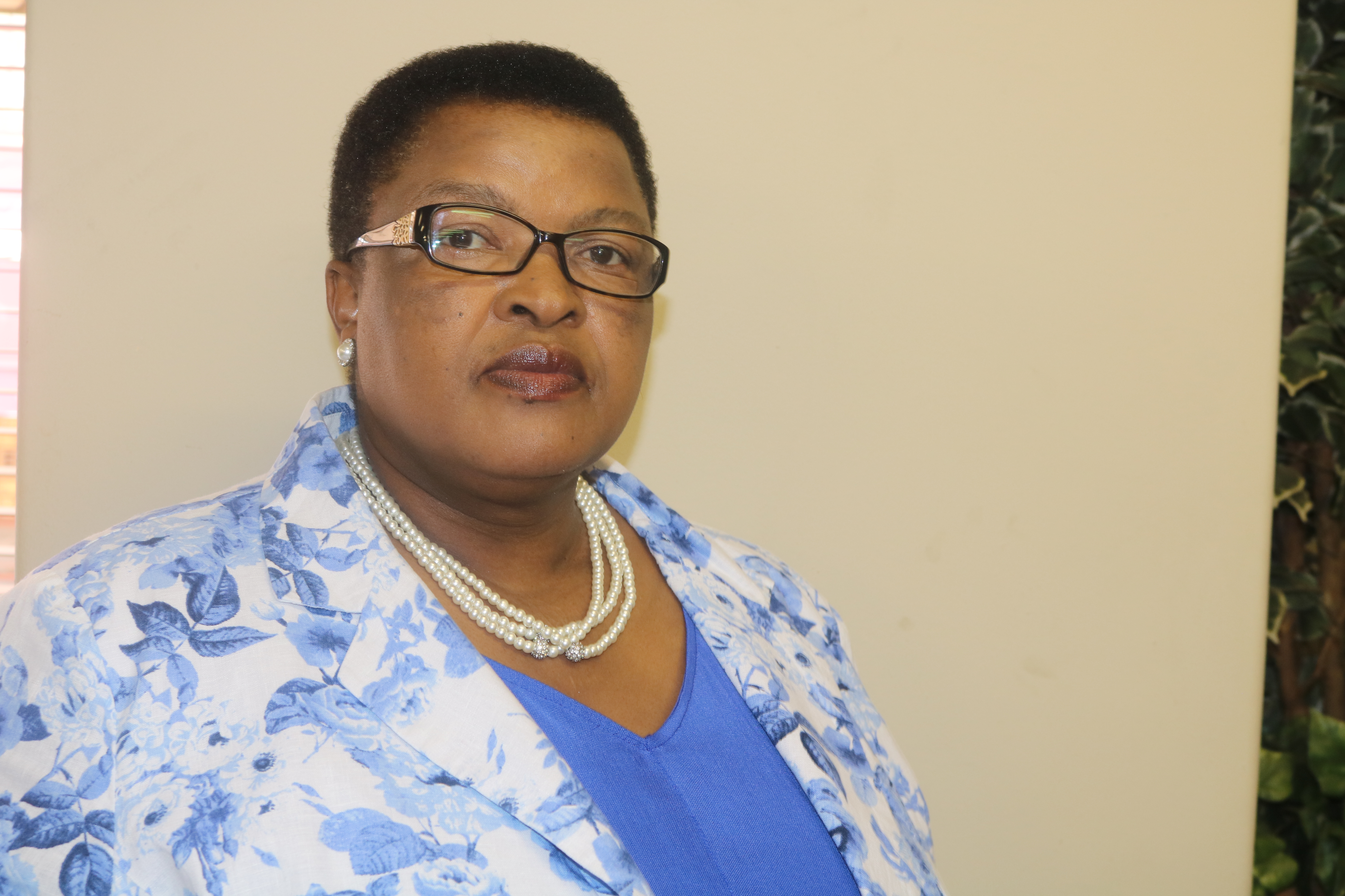 Dr. M.J Masalesa